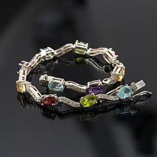 Oriental silver bracelet with colorful stones