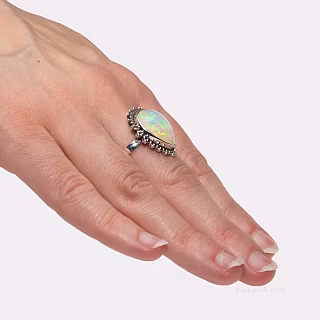 Silver ring with natural opal - fire enclosed in the stone