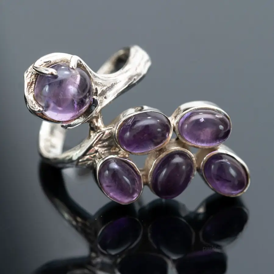 Silver power ring with amethyst