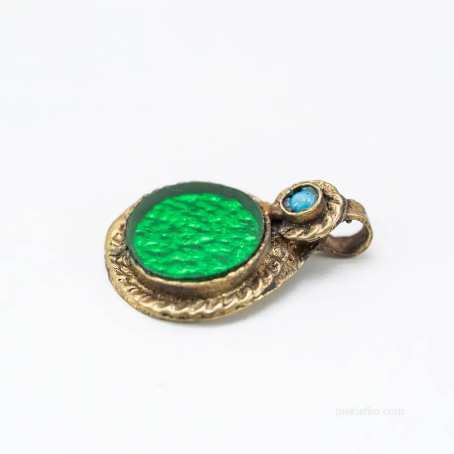 Tribal pendant with green glass