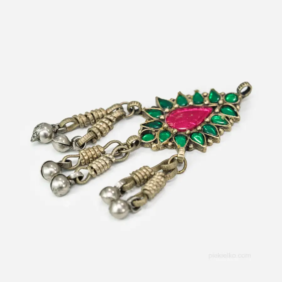 Tribal pendant with green glass