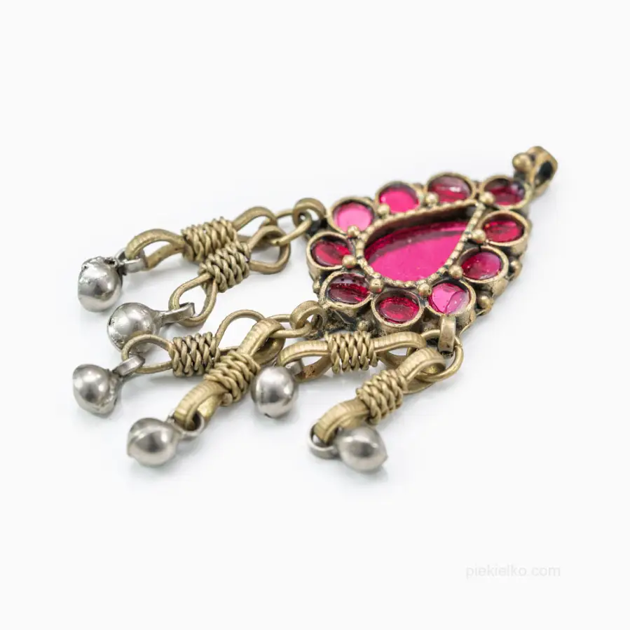 Tribal pendant with pink glass