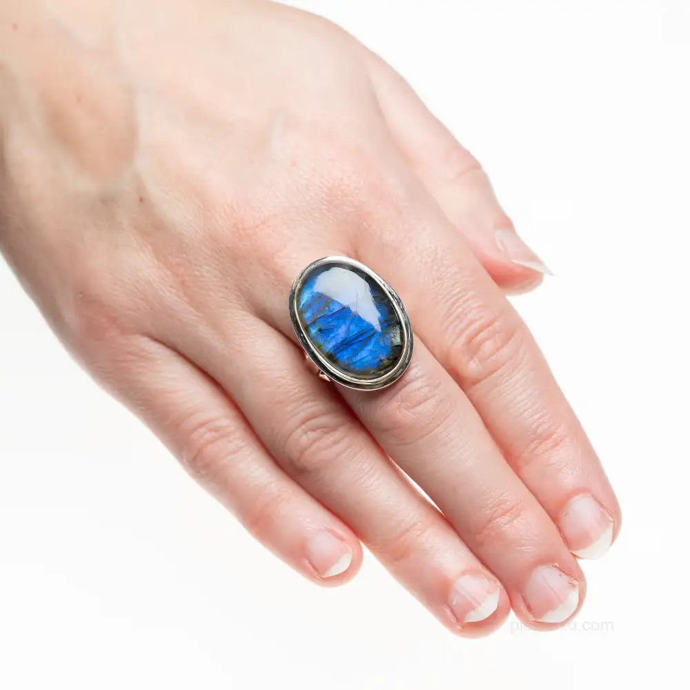 Silver ring with magical labradorite