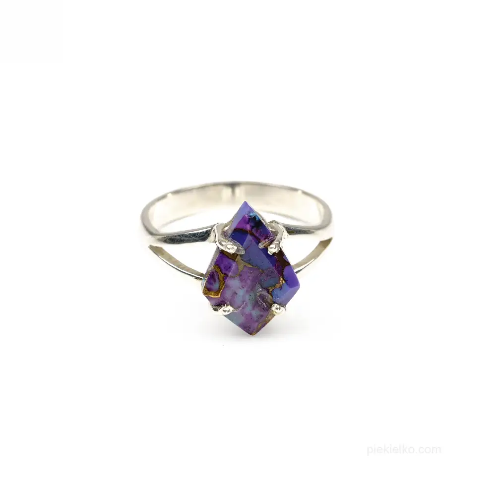 Silver ring with purple stone and copper veins