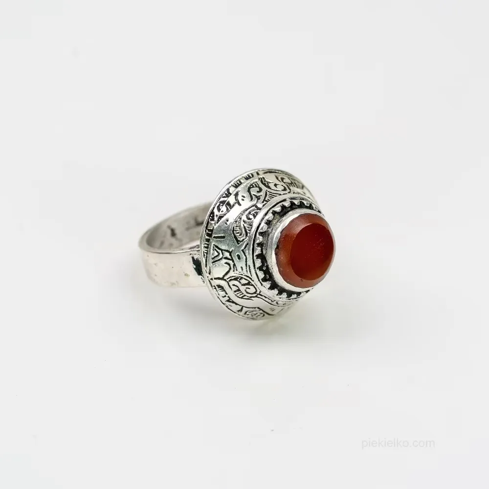 Pakistani red agate ring in a decorative band