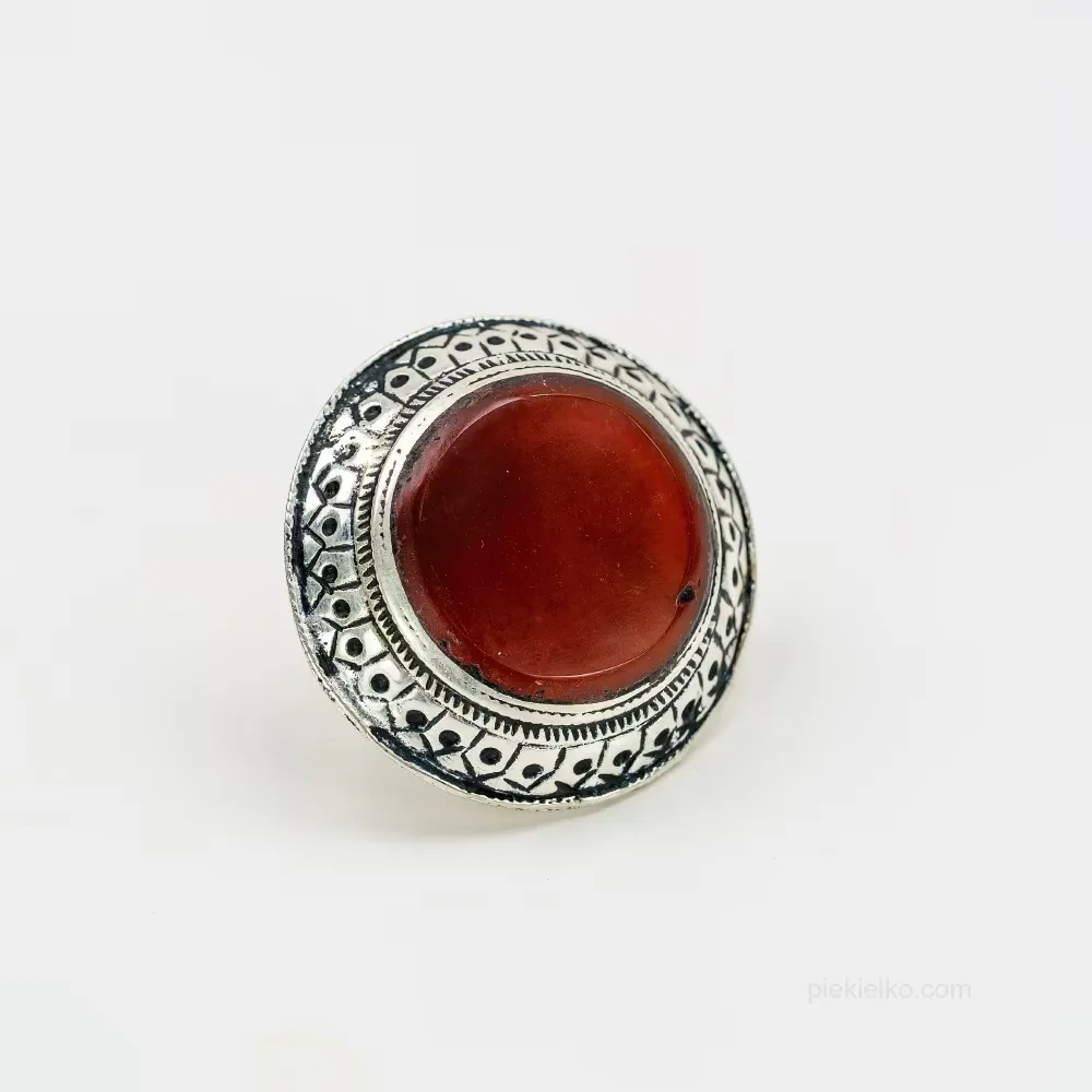 Fiery Round &ndash; Carnelian in a Crown with Oxidation