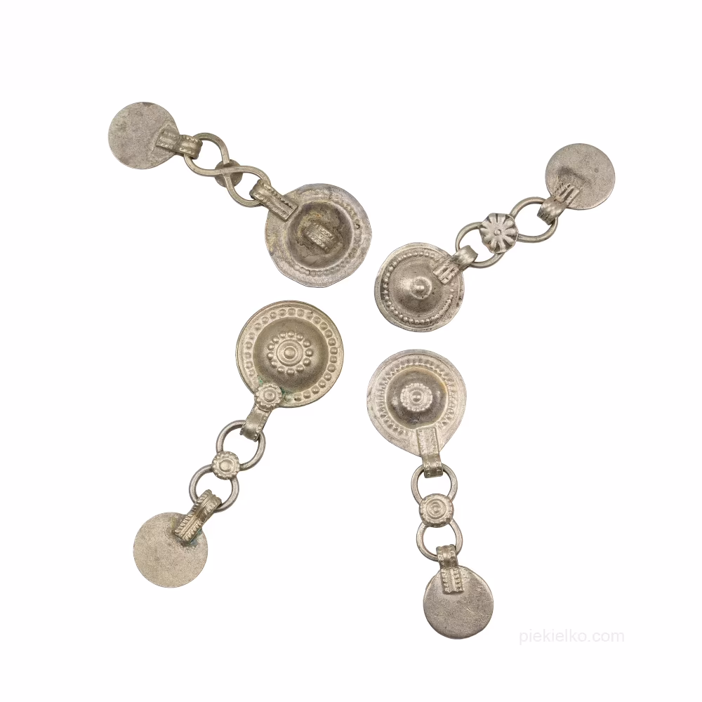 Mosiężne guziki z plemienia Kuchi