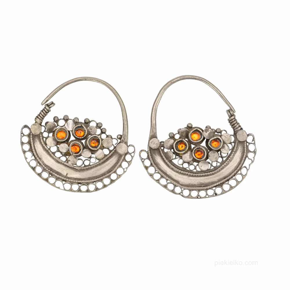 Openwork crescents with orange glass