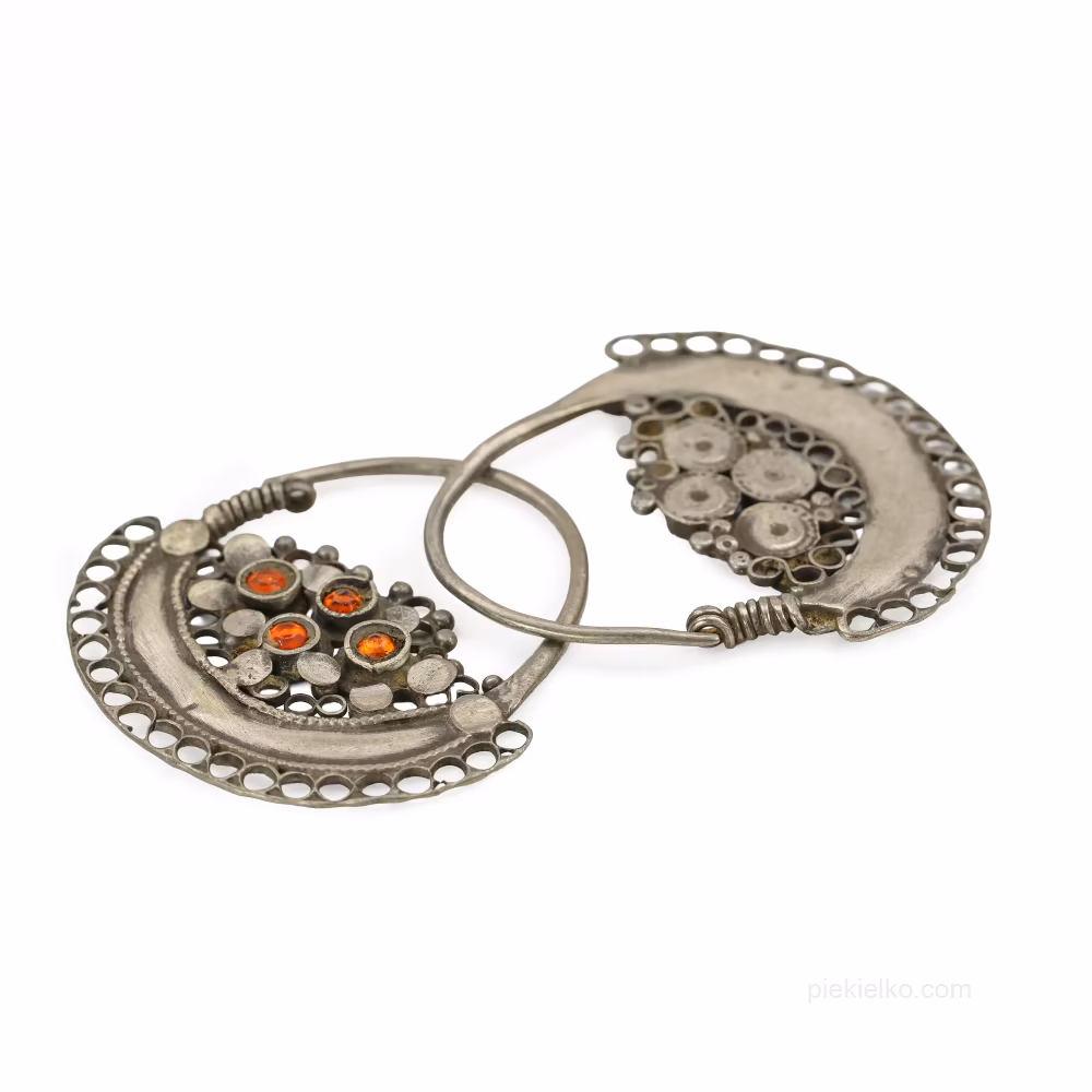 Ażurowe półksiężyce z pomarańczowym szkłem