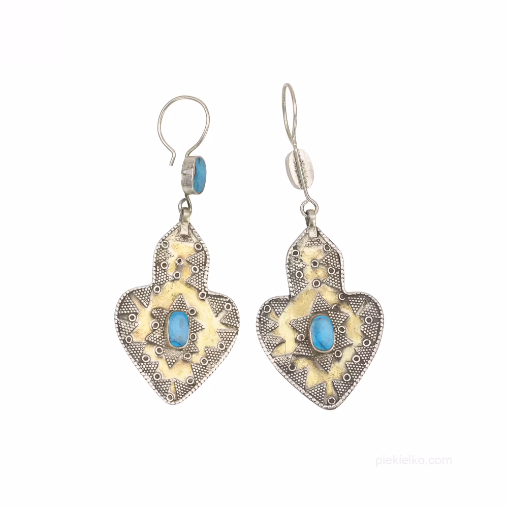 Slim silver pendants with turquoise and a gold background
