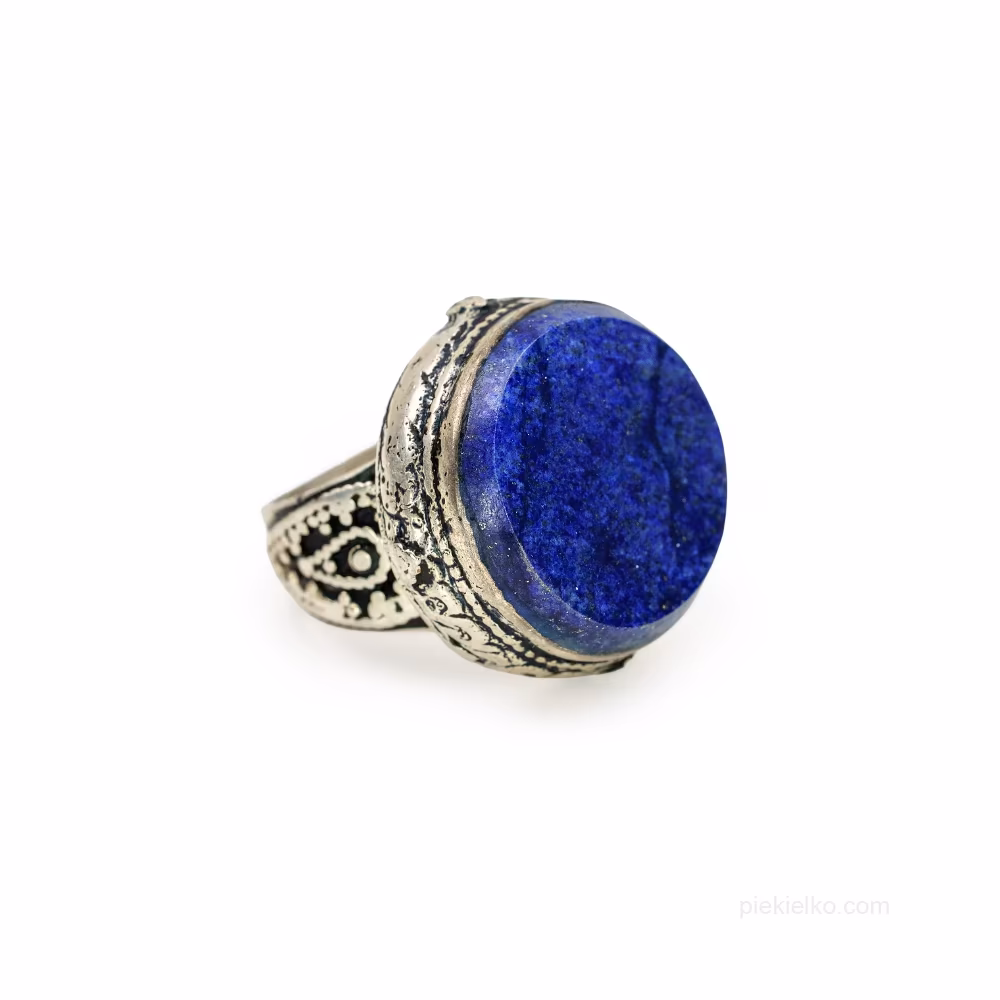 Lapis lazuli ring in a dark setting