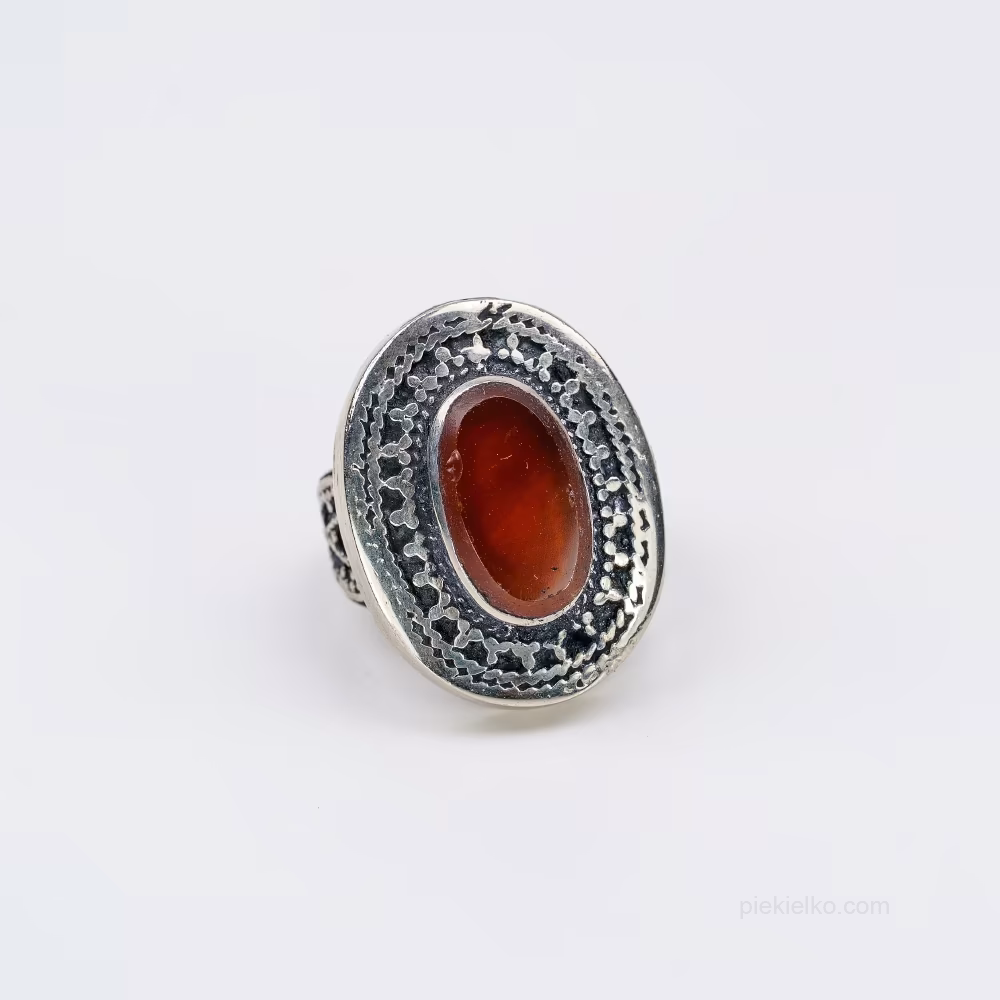 Pakistani red agate ring in a decorative frame