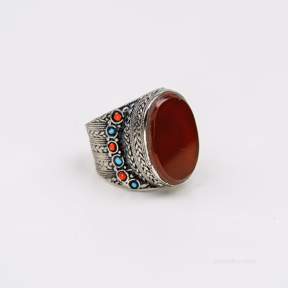 Signet ring with red agate in a decorated crown