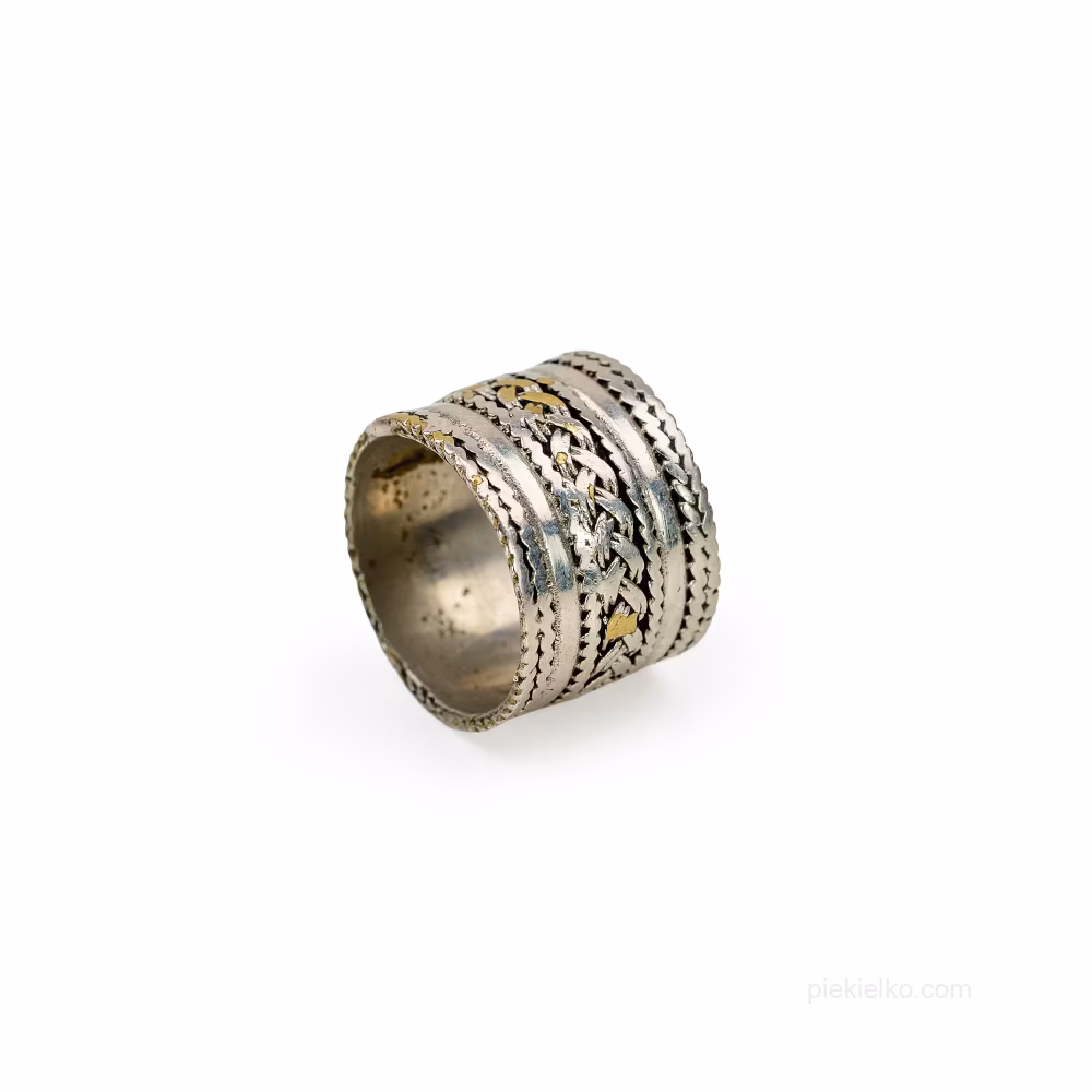 Wide oxidized ring with intricate ornamentation - without a stone